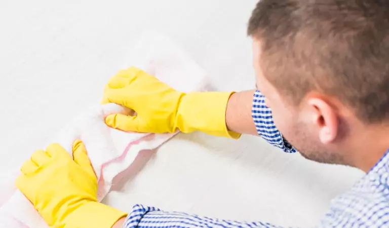 young man cleaning up the floors